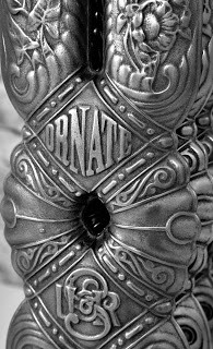 Ornate cast iron radiator in hand burnished finish